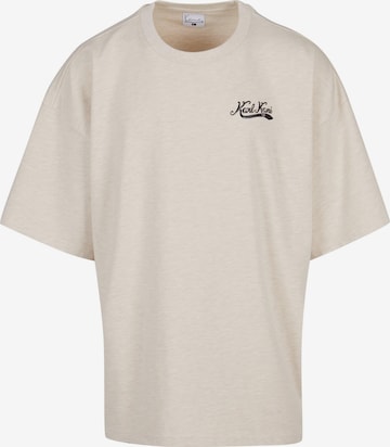 T-Shirt Karl Kani en beige : devant