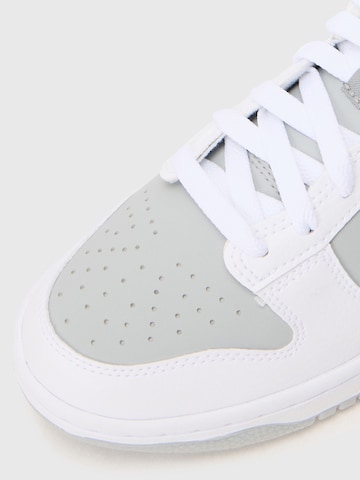 Baskets 'DUNK' Nike Sportswear en blanc