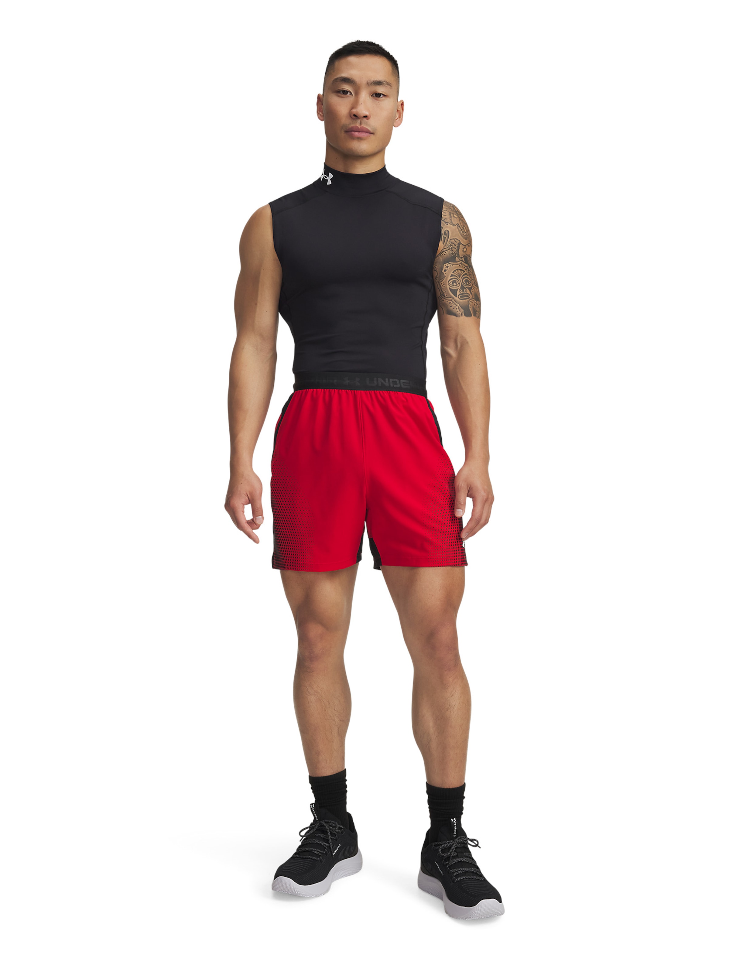 UNDER ARMOUR Regular Workout Pants 'Vanish' in Red