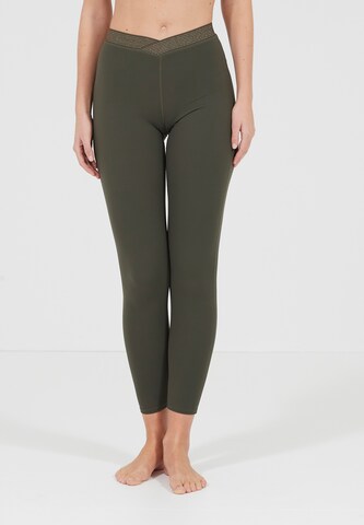 Athlecia Slim fit Workout Pants 'Feliz' in Green: front