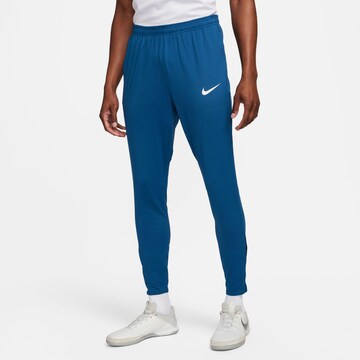 NIKE Slim fit Workout Pants in Blue: front