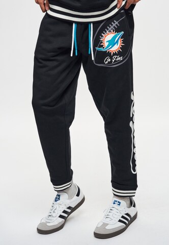 Recovered Regular Sports trousers 'NFL Dolphins Go Fins' in Black