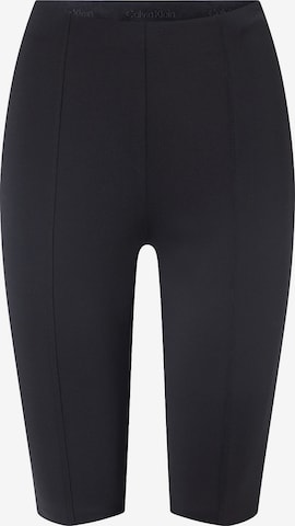 Pantaloni de la Calvin Klein pe negru: față