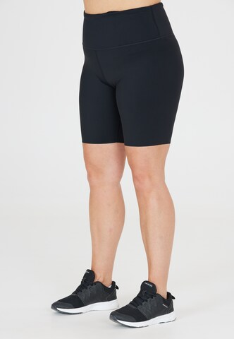 Q by Endurance Skinny Sportbroek 'Floriee' in Zwart: voorkant