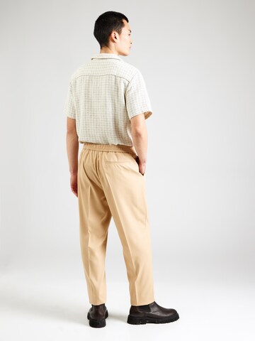 TOPMAN Zwężany krój Cygaretki w kolorze beżowy