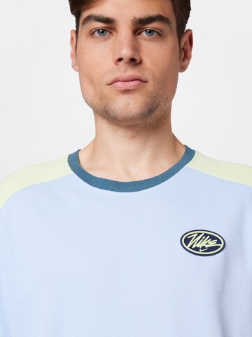 NIKE Performance shirt in Blue