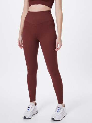 Skinny Pantalon de sport 'Kate' ABOUT YOU en rouge : devant