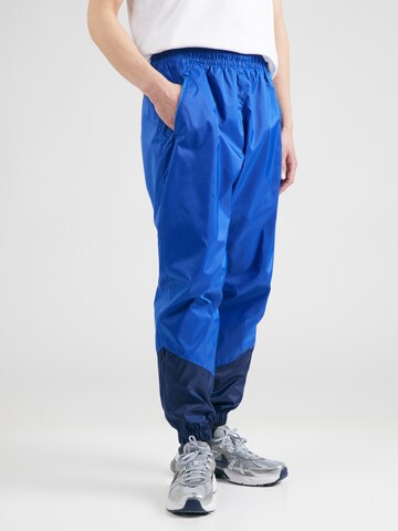 Effilé Pantalon 'Windrunner' Nike Sportswear en bleu : devant