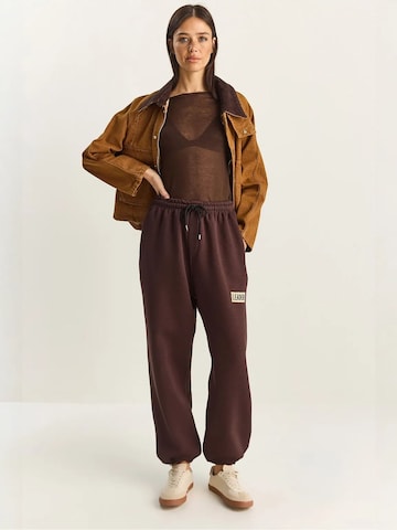 Bianco Lucci Loose fit Trousers in Brown