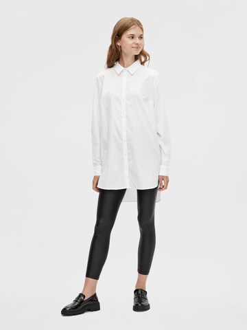 Skinny Leggings 'Shiny' di PIECES in nero