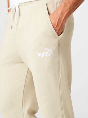 PUMA Tapered Workout Pants in Beige