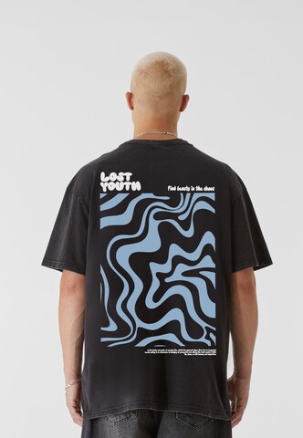 Lost Youth T-Shirt 'Beautiful Chaos' in Schwarz: Vorderseite