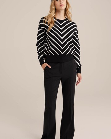 Flared Pantaloni di WE Fashion in nero
