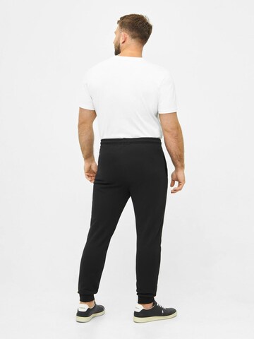 NIKIN Tapered Trousers 'Tree' in Black