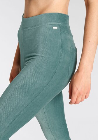 LASCANA Flared Trousers in Green