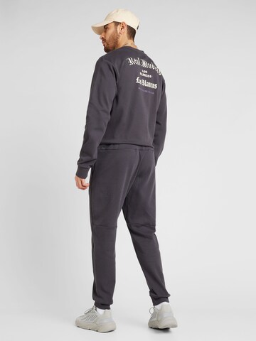 ADIDAS PERFORMANCE Tapered Urheiluhousut 'REAL CS' värissä musta