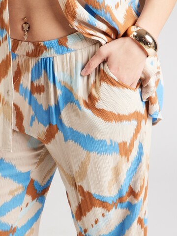 Wide leg Pantaloni di ONLY Carmakoma in beige