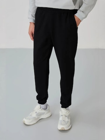 Tommy Life Sportpak in Grijs