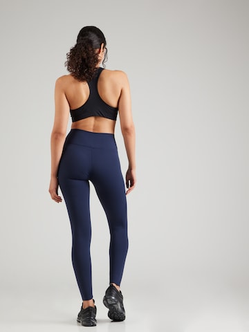 Skinny Pantaloni sportivi 'ONE' di NIKE in blu