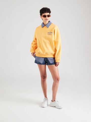 Sweat-shirt 'Island Radio' On Vacation Club en jaune
