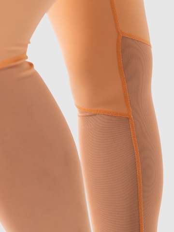 Skinny Pantalon de sport 'Karlie' Smilodox en orange