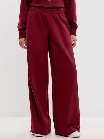 Cat e Lolette - regular Pantalón 'Palazzo Trousers' en rojo