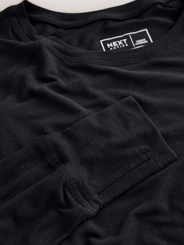 T-shirt fonctionnel Next en noir