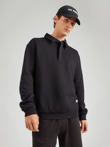 Sweat-shirt 'NICCO' GUESS en noir : devant