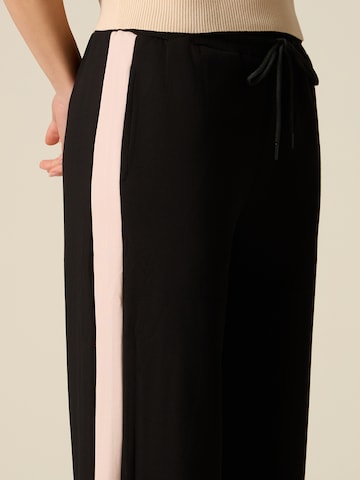 oltre Baggy Trousers in Black