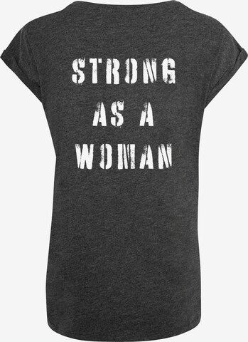 Merchcode T-Shirt 'WD - Strong As A Woman' in Grau