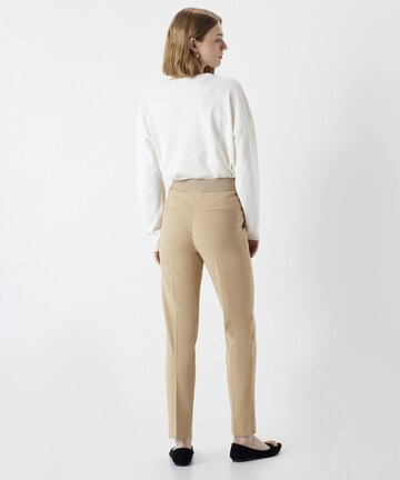 Coupe slim Pantalon à plis Ipekyol en beige