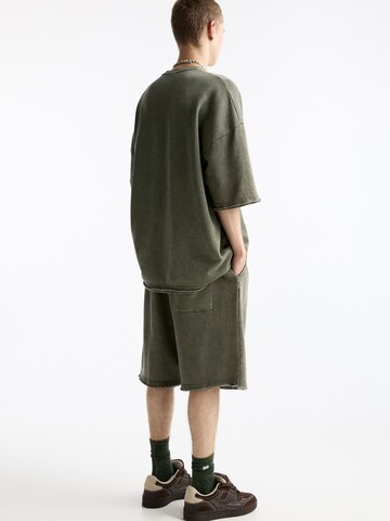 Bluză de molton de la Pull&Bear pe verde