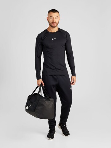 NIKE Funktionsskjorte i sort