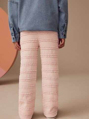Flared Pantaloni di Next in rosa