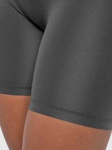 Skinny Pantalon de sport Smilodox en gris