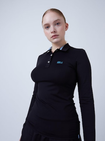 SPORTKIND Funktionsshirt 'Poloshirt Langarm'‌‌‌‌‌‌‌‌ in Schwarz: Vorderseite