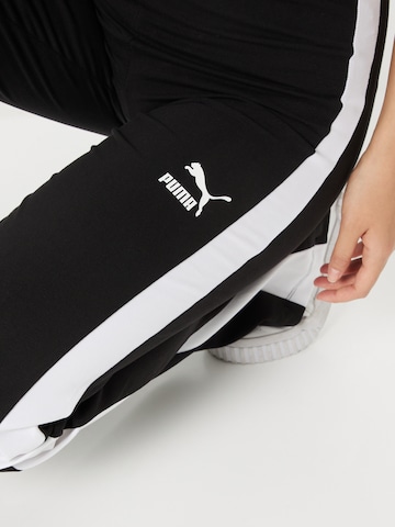 PUMA Flared Trousers in Black