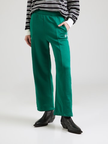 Loosefit Pantaloni di Champion Authentic Athletic Apparel in verde: frontale