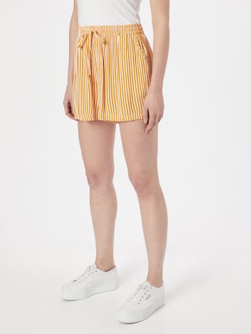 ABOUT YOU Loose fit Pants 'Mila' in Yellow: front