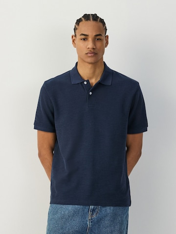 Tricou de la Next pe albastru: față