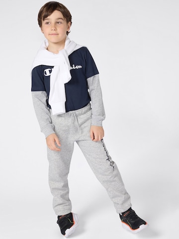 Champion Authentic Athletic Apparel Tapered Housut värissä harmaa