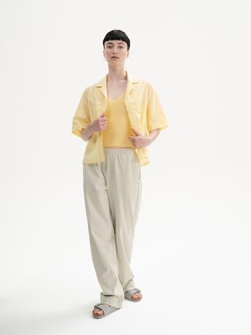 Tops en tricot 'RHADA' MELA en jaune