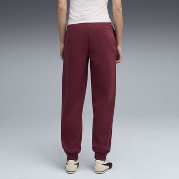 PUMA Tapered Sportbroek in Rood