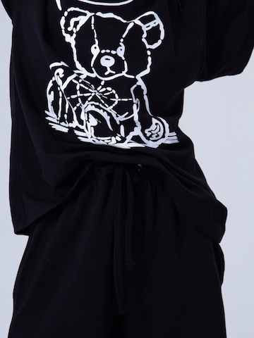 WINKIKI Schlafanzug‌‌‌‌‌‌‌‌‌‌ in Schwarz