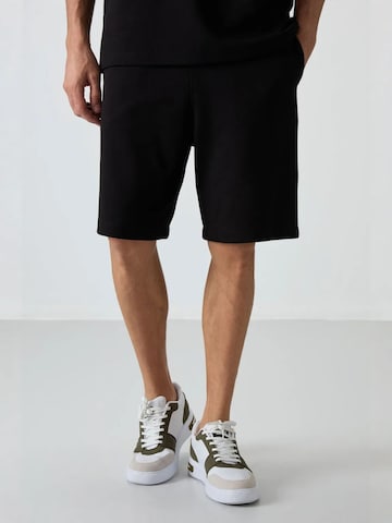 Regular Pantalon Tommy Life en noir