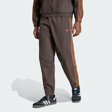 Pantalon 'Firebird' ADIDAS ORIGINALS en marron : devant