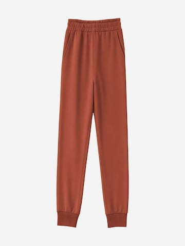Effilé Pantalon de sport 'Jogginghose' Tommy Life en rouge