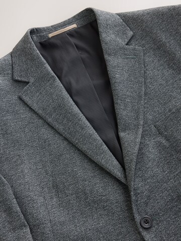 Next Slim fit Business-colbert 'Motionflex' in Grijs