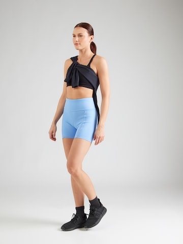 Reebok Skinny Sportnadrágok 'LUX' - kék