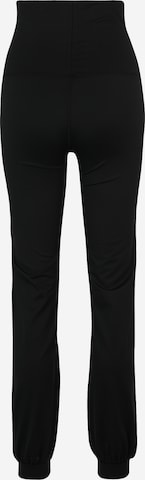 CURARE Yogawear Zwężany krój Spodnie sportowe 'Breath' w kolorze czarny